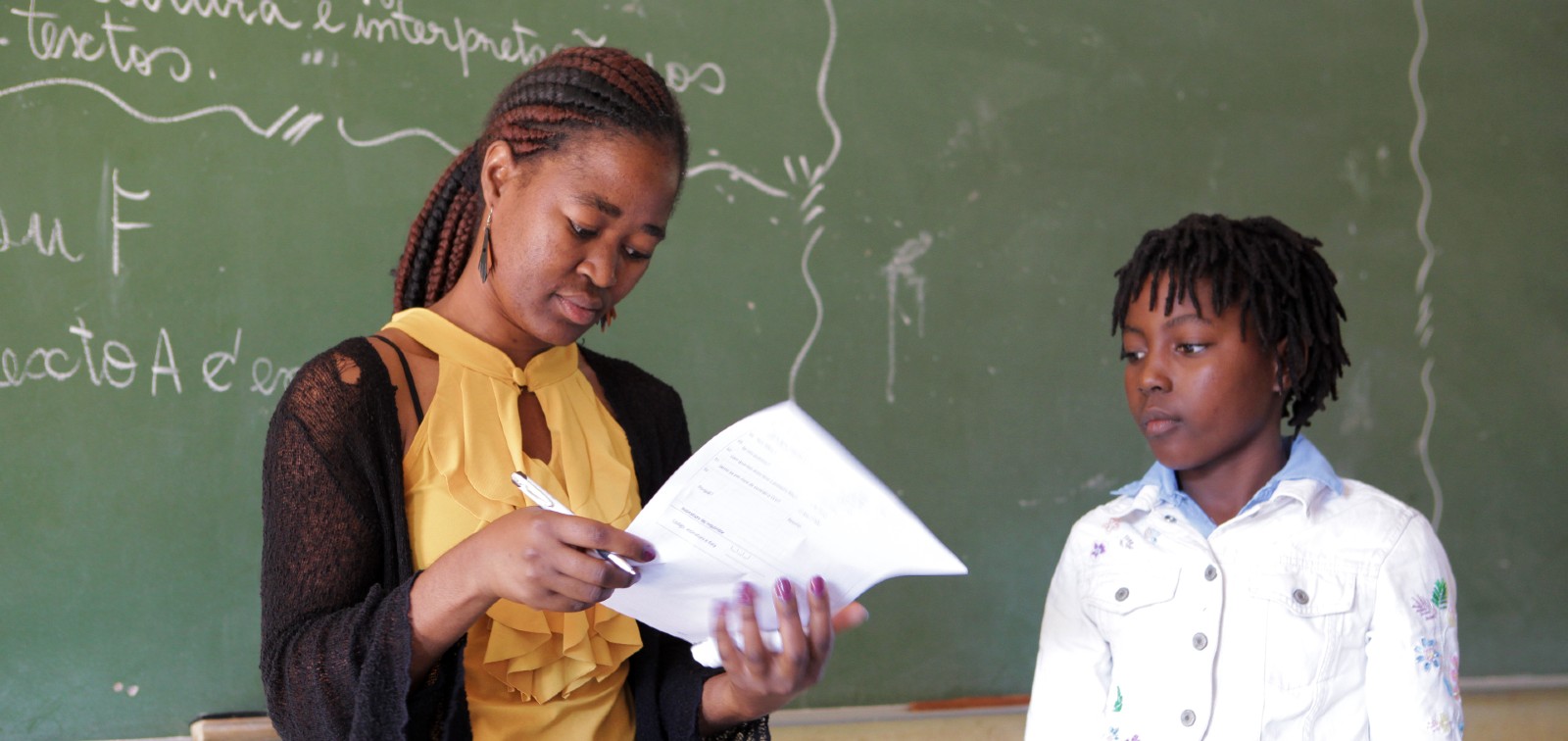 Teacher with student